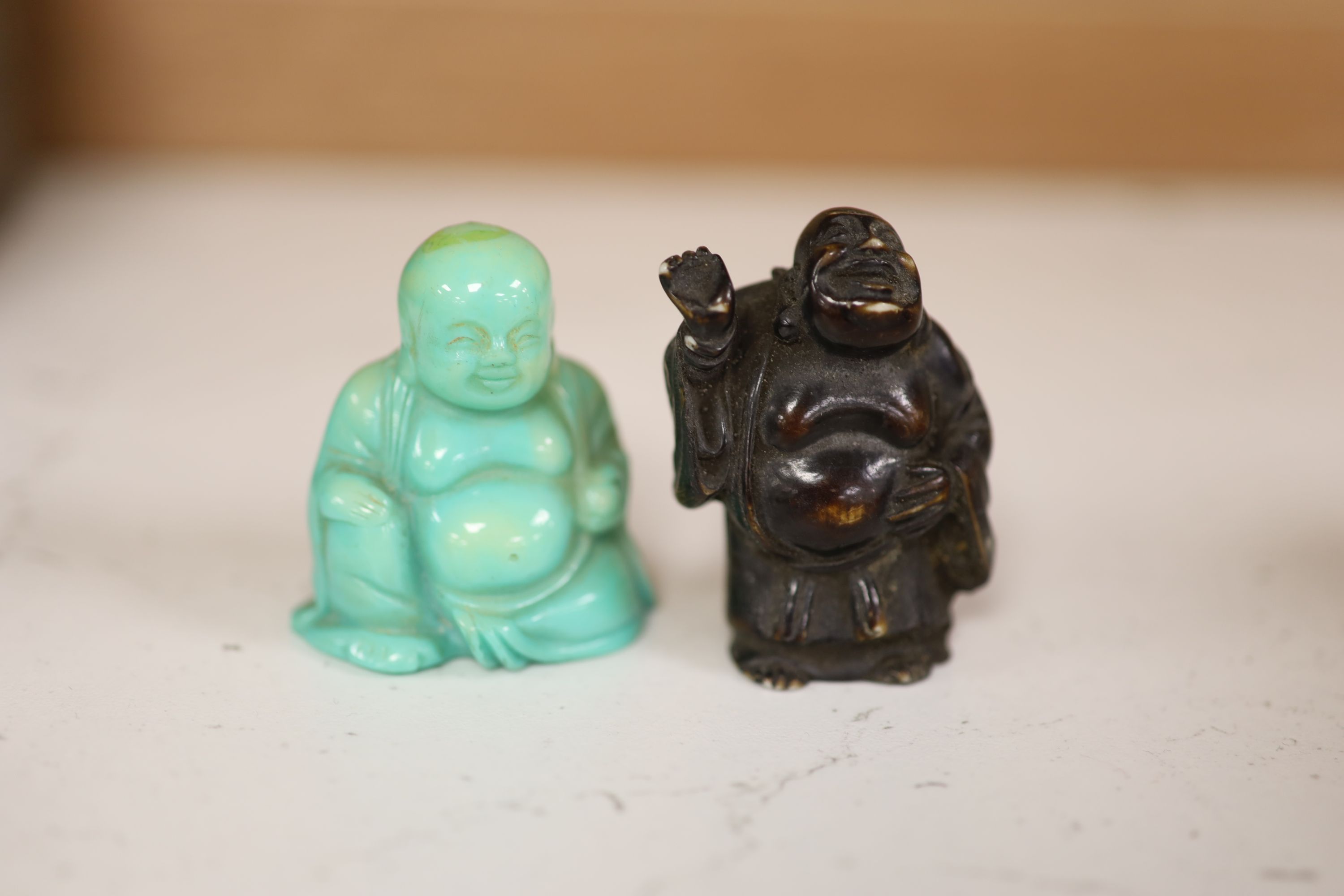 A small miscellaneous Oriental collection including enamel snuff boxes, Buddha carvings etc.